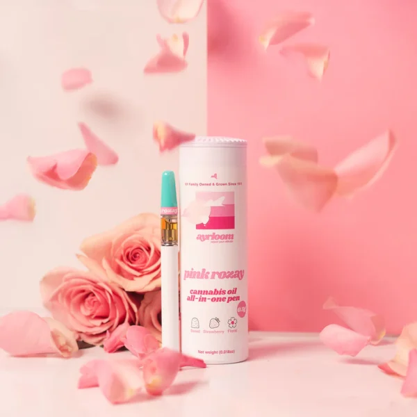 A stylish Pink Rozay all-in-one cannabis oil vape pen with soft, elegant, pink-hued branding, suggesting a floral and relaxing experience.