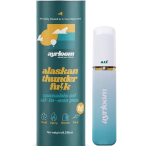 A sleek Alaskan Thunder Fu*k all-in-one cannabis oil vape pen with bold, earthy branding and hints of green and orange.