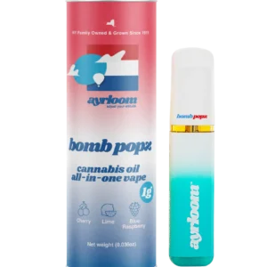 A sleek, modern Bomb Popz all-in-one cannabis oil vape pen with vibrant, energetic branding and a clean finish, resting on a minimalist surface.