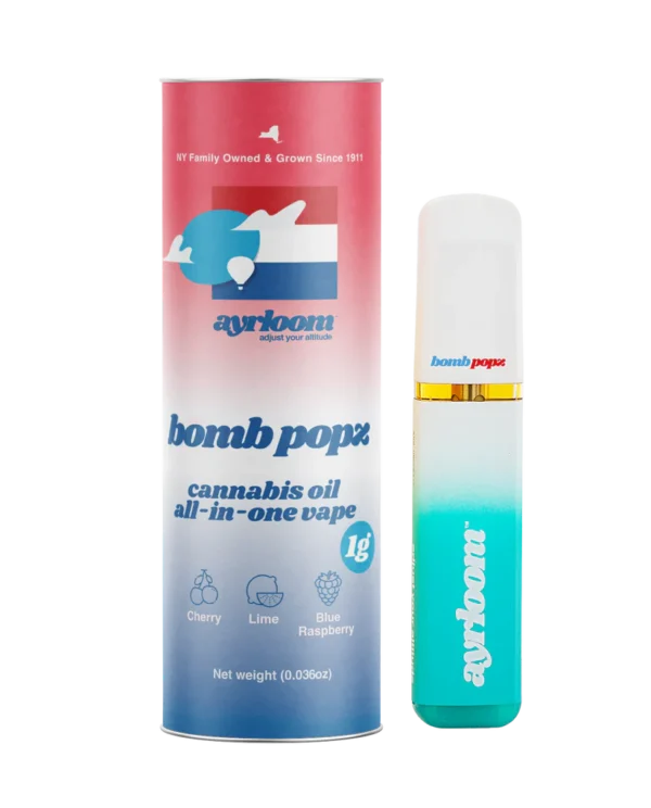 A sleek, modern Bomb Popz all-in-one cannabis oil vape pen with vibrant, energetic branding and a clean finish, resting on a minimalist surface.