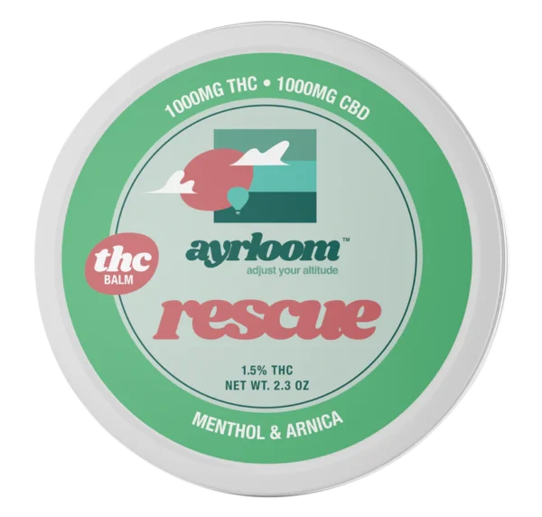 A small container of Ayrloom Rescue Balm with blue and white branding, highlighting menthol and arnica, positioned for easy application.