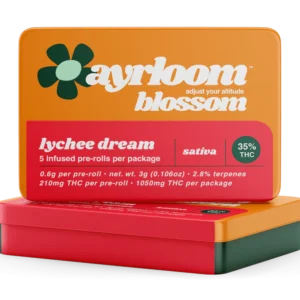 A pack of Ayrloom Blossom pre-rolls with Lychee Dream branding, featuring a subtle illustration of lychee, pear, and pink flowers.